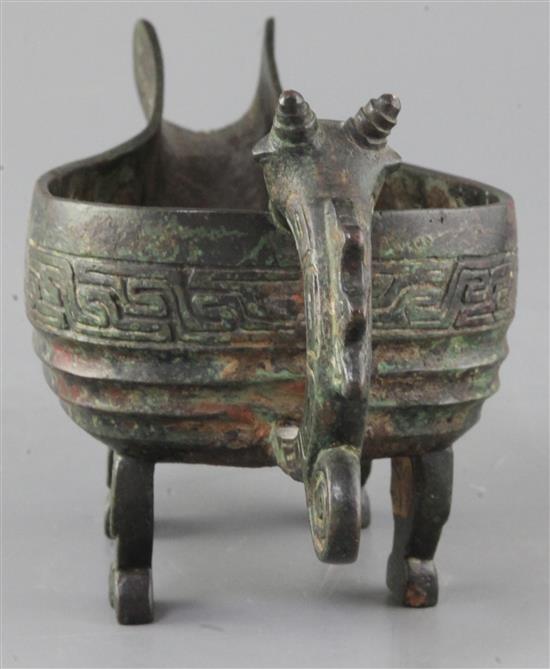 A Chinese archaic bronze ritual pouring vessel, Yi, possibly Western Zhou dynasty, 9th-8th century B.C., 28cm long